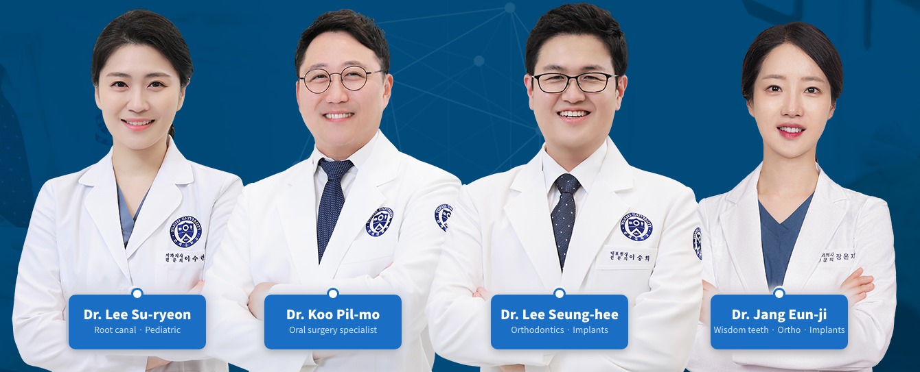 The four specialist dentists of Yonsei Godeok S Dental Clinic standing together in white coats